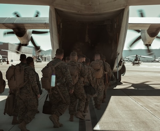 soldiers boarding plane